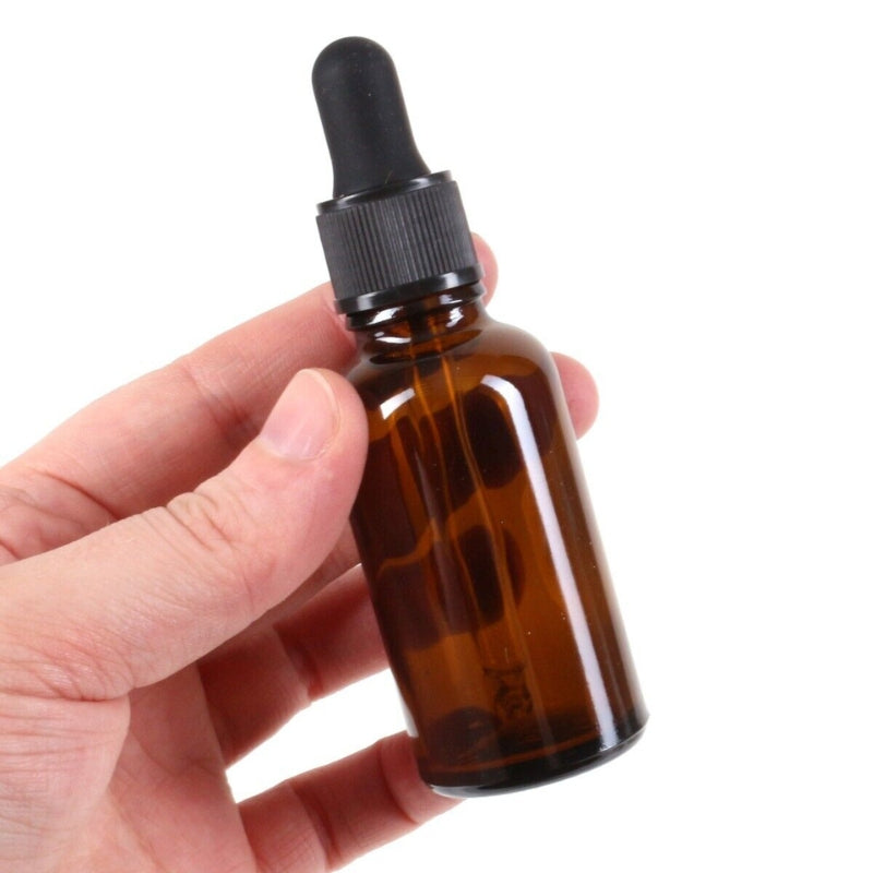 bouteille avec pipette en verre